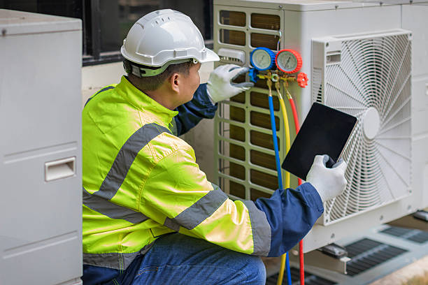 Professional Hvac technician working in Wheaton, MD